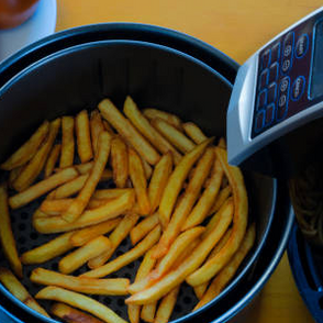 Hvordan lage pommes frites i en airfryer